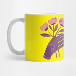 Purple hand with pink and yellow flowers for you on yellow Mug